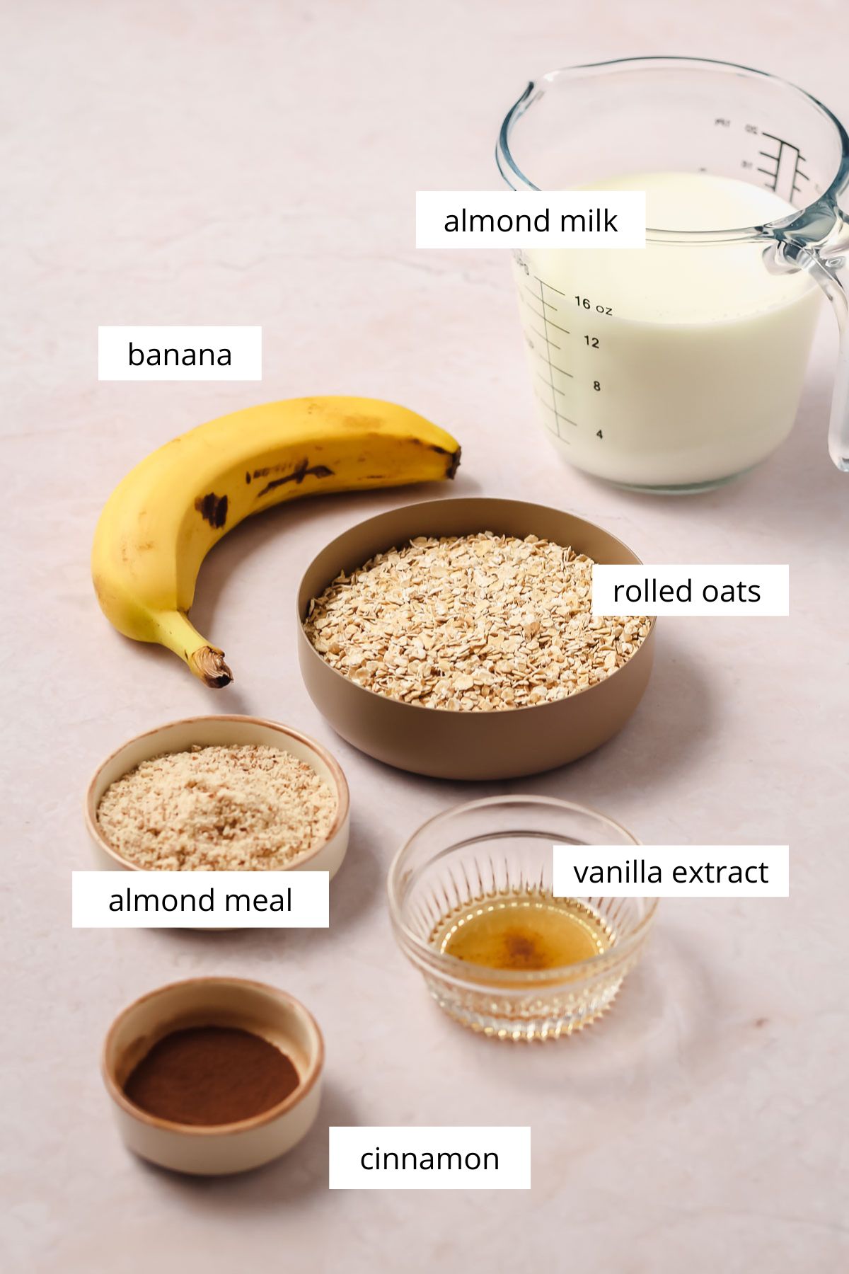 ingredients for vegan banana porridge on rosy background.