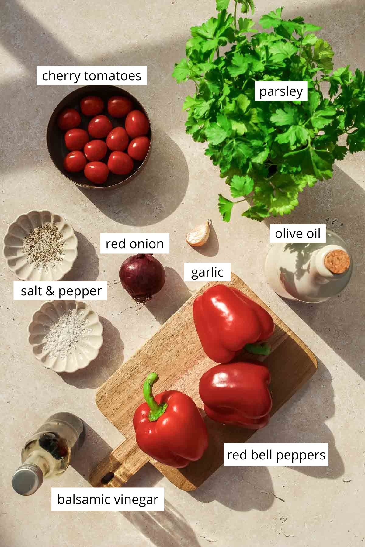 ingredients for roasted pepper salad with balsamic vinegar with labels.