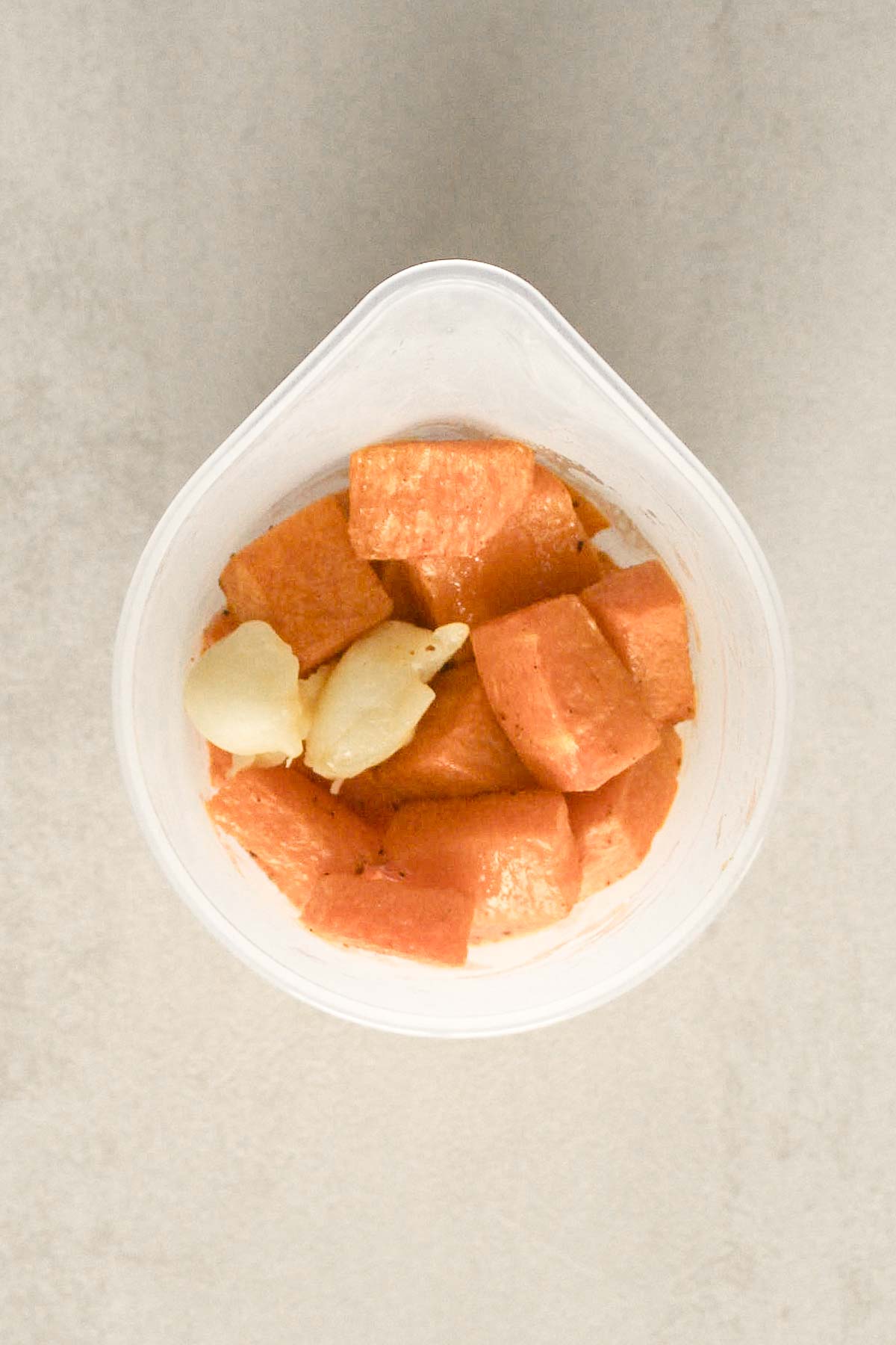 roasted pumpkin and garlic in blending jar.